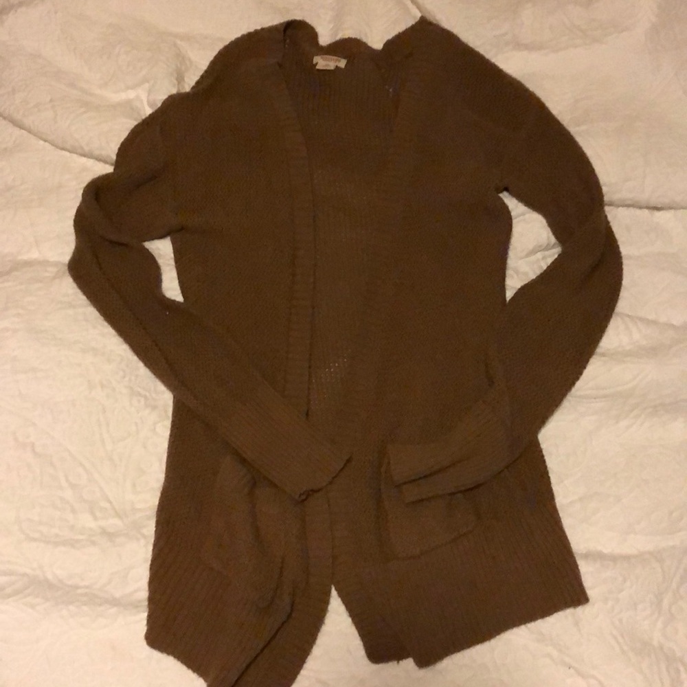 A dark mustard yellow cardigan